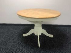 A contemporary pine topped extending table