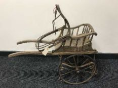 A Victorian miniature rickshaw