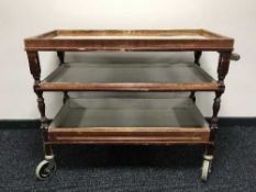 A three tier butler's serving trolley