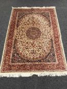 A fringed Persian Kashan rug 190cm x 140cm