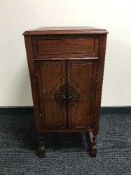An oak gramophone cabinet