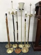 Seven continental brass standard lamps