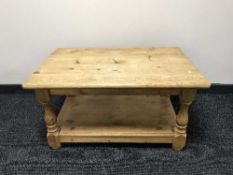 A pine two tier coffee table