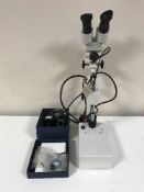 A medial microscope with accessories
