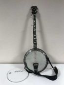 A Sheltone five string banjo,