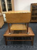 A teak tiled topped kitchen table and a teak trolley