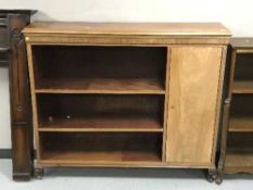 A set of mahogany open shelves