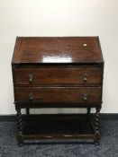 An oak writing bureau