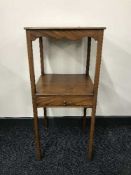 A late Victorian mahogany two tier plant table