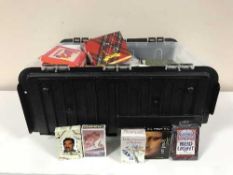 A box containing a large quantity of playing cards