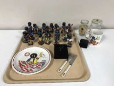 A tray of Robertsons Golly figures, baby's first cup and cutlery set,