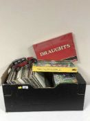 A box of records, games, die cast cars,
