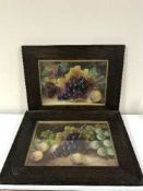 A pair of oak framed still life pictures depicting fruit together with framed and unframed prints -