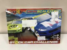 Six boxed Scalectrix Track Car Challenge race sets
