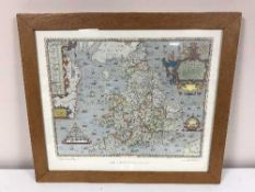 A framed print of a spitfire in flight by Barrie A. F.