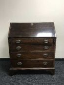 A Georgian mahogany bureau