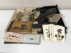 A tray of four piece ebonised dressing table set, treen thread holder, ivory pieces,