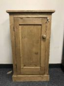 A reclaimed pine single door cupboard
