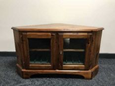 A Ducal Pine corner TV stand and a nest of three tables