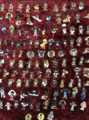 A large quantity of golly pin badges