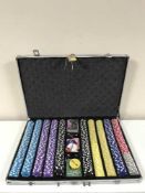 A poker chip set in aluminium case and a boxed poker table top