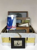 Two boxes of assorted framed pictures, jigsaws, Red Bull signs, Heaton Cooper print,