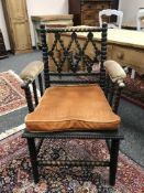 An oak bobbin armchair