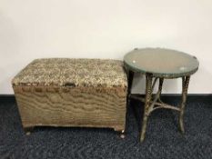 A Lloyd Loom occasional table and blanket box