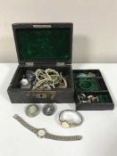 A leather jewellery box of costume jewellery and lady's wrist watches