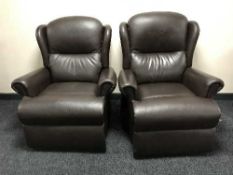 A pair of brown leather electric reclining armchairs