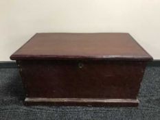 A stained pine blanket box