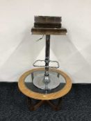 A teak coffee table and a chrome bar chair