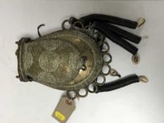 A brass Benin tribal tobacco pouch