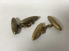 A pair of 15ct gold cuff links
