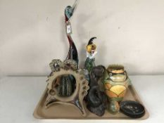A tray of Murano glass clown, duck figure, pottery ornaments,