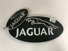 Two oval cast metal signs - Jaguar