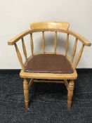 A beech captain's armchair