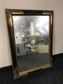 A gilt framed over mantel mirror