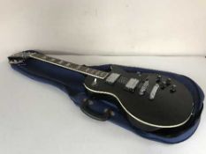 A Kay Model K 30 electric guitar in carry bag