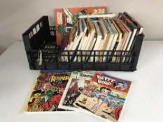 A box of graphic novels and hardback books - Dan Dare, Flash Gordon,
