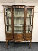 A Victorian inlaid mahogany display cabinet