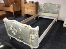 A cream floral 3' bed frame