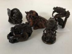 A group of five carved Japanese netsukes