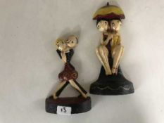 Two cast metal Art Deco style door stops