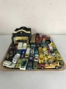 A tray of four Ringtons die cast vehicles, unboxed play worn die cast cars, Corgi,