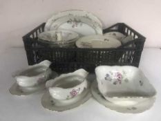 Four crates of German floral dinner service, plates of coaching scenes,