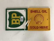 Two cast metal advertising signs - BP and Shell