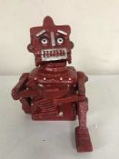 A cast metal robot money bank