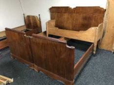 A pair of 3' bed frames which form 6' bed