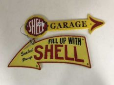 Two cast metal Shell advertising signs